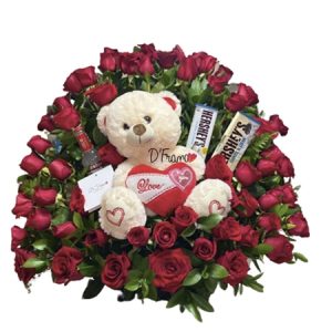 arreglo floral con peluche y chocolates Cali