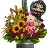 Arreglo floral y peluche
